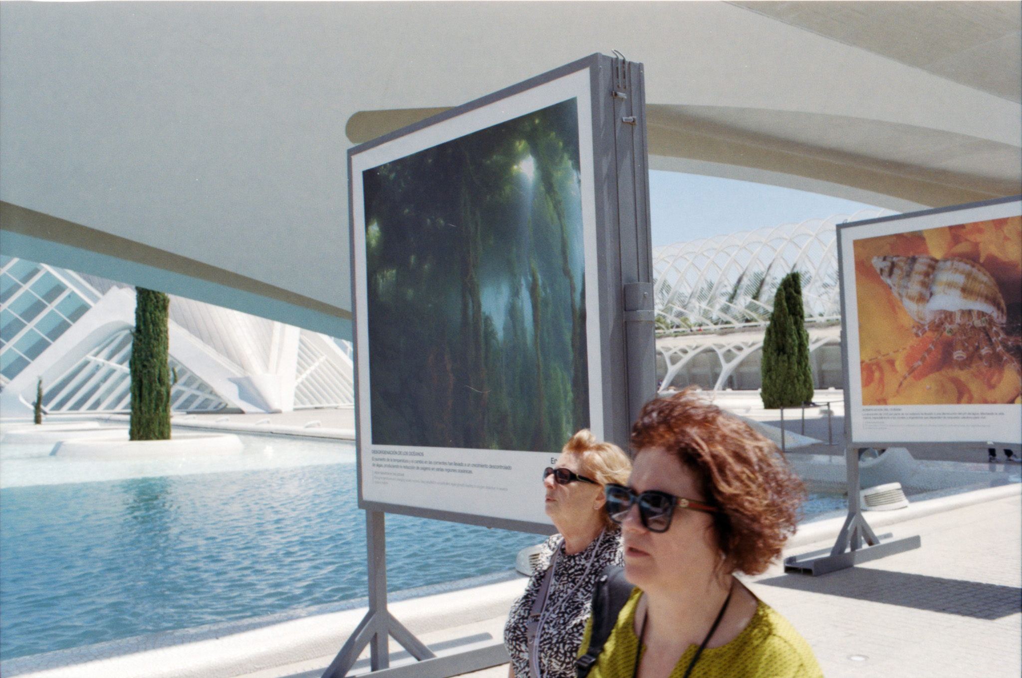 Two women at an outdoor exhibition at the City of Arts and Sciences, Valencia